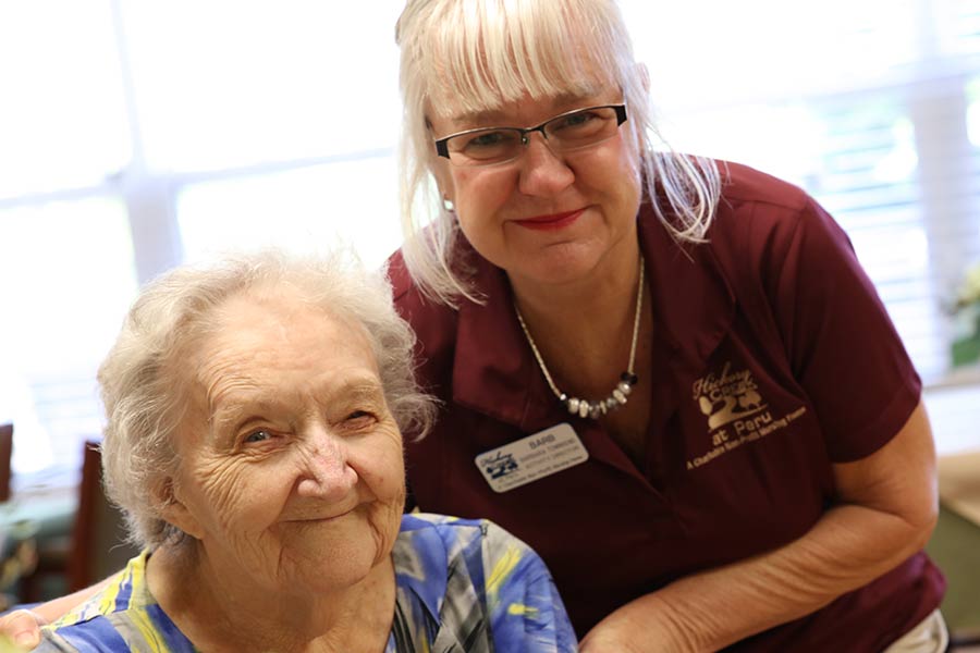 staff-and-elderly-lady-in-blue