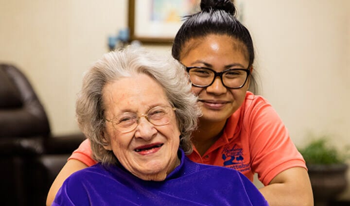 woman-staff-with-glasses-and-elderly-woman-long-term-care